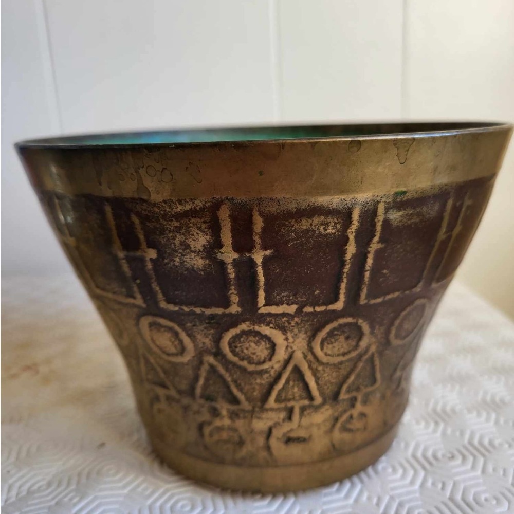 80 year old brass pot